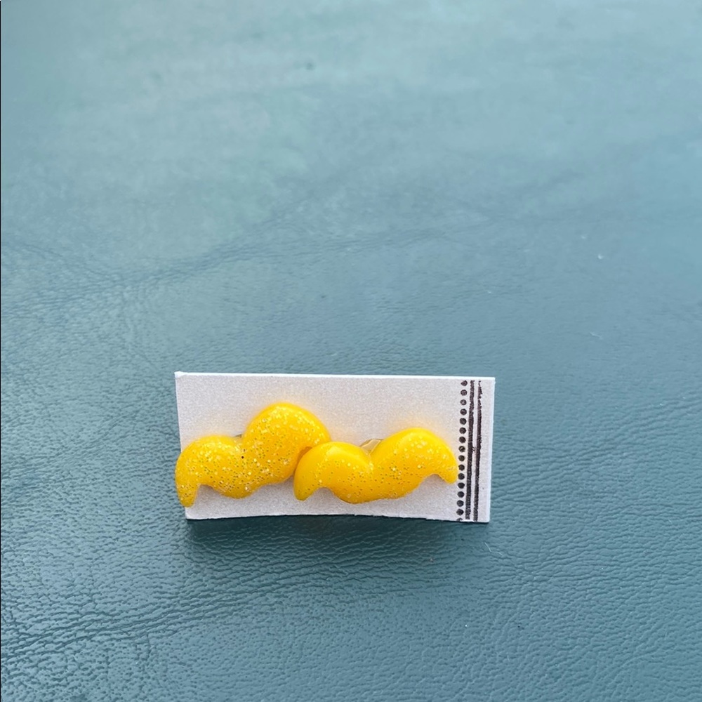 Yellow mustache studded earrings